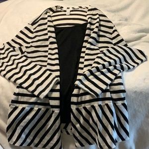 Office casual black knit top sewn into a striped long soft top.